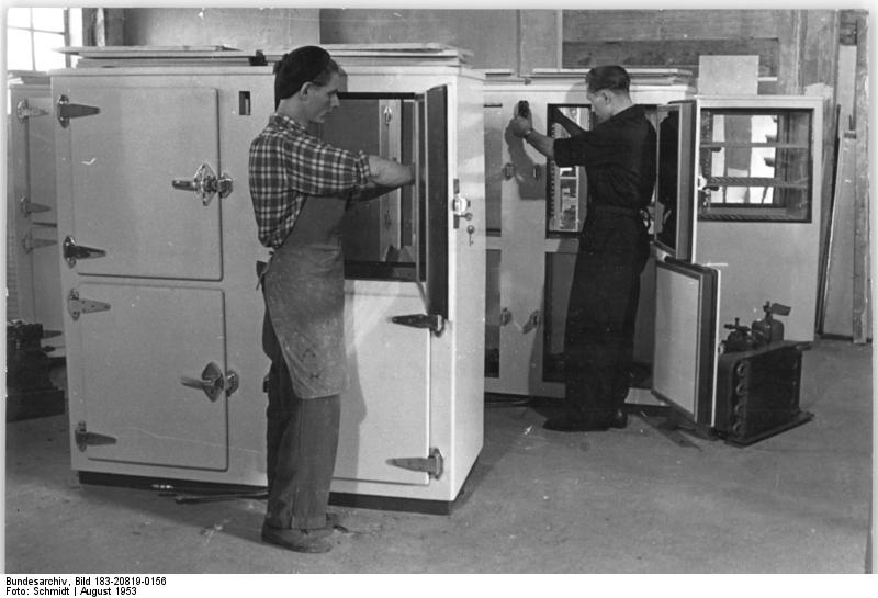 1950s photo of moving a fridge in Germany