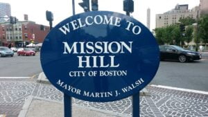 Brigham Circle Welcome to Mission Hill Sign greets Mission Hill Movers